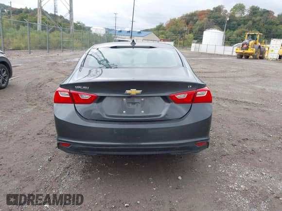 2018 Chevrolet Malibu LT z VIN 1G1ZD5ST6JF107433, wystawiony jako IAAI lot #43281943 z przebiegiem 59 802 mil mil oraz . Historia ofert i sprzedaży dostępna na DreamBid. Obrazek 16.