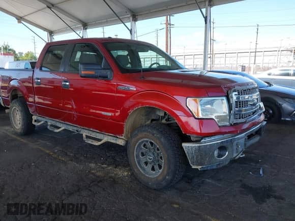 2013 Ford F-150 Lariat with VIN 1FTFW1ET5DKE88227, listed as a IAAI auction lot 43330750 with 140,077 mi miles and . Bid and sale history available at DreamBid. Image 1.