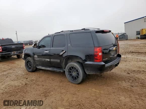 2013 Chevrolet Tahoe LT with VIN 1GNSCBE00DR359815, listed as a Copart auction lot 69586395 with 148,444 mi miles and Salvage title. Bid and sale history available at DreamBid. Image 2.
