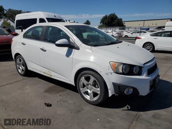 2014 Chevrolet Sonic LTZ with VIN 1G1JE5SB8E4226488, listed as a Copart auction lot 71453255 with 146,249 mi miles and Clean title. Bid and sale history available at DreamBid. Image 4.
