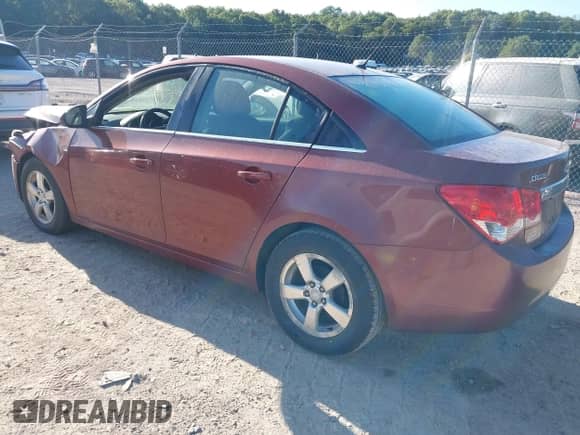 2013 Chevrolet Cruze LT with VIN 1G1PK5SB4D7202849, listed as a IAAI auction lot 43092242 with 115,252 mi miles and . Bid and sale history available at DreamBid. Image 3.