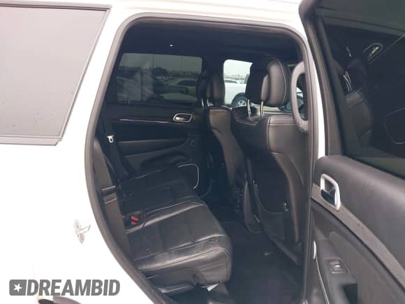 2016 Jeep Grand Cherokee SRT with VIN 1C4RJFDJ0GC456325, listed as a IAAI auction lot 41425211 with 159,746 mi miles and . Bid and sale history available at DreamBid. Image 8.