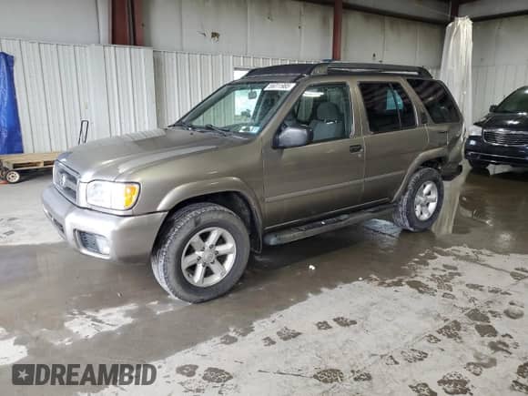 2003 Nissan Pathfinder SE z VIN JN8DR09Y23W807996, wystawiony jako Copart lot #56011985 z przebiegiem 158 727 mil mil oraz Szkoda całkowita • Salvage title. Historia ofert i sprzedaży dostępna na DreamBid. Obrazek 1.