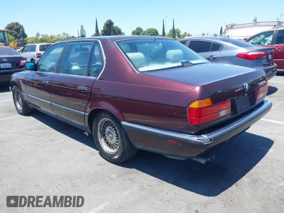 1993 BMW 7 Series with VIN WBAGD8327PDE87456, listed as a IAAI auction lot 42720246 with 143,502 mi miles and . Bid and sale history available at DreamBid. Image 3.