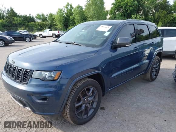 2021 Jeep Grand Cherokee Limited with VIN 1C4RJFBG3MC602848, listed as a IAAI auction lot 42464570 with 90,800 mi miles and . Bid and sale history available at DreamBid. Image 18.