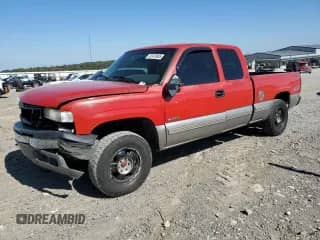 2000 Chevrolet Silverado 1500 LS with VIN 2GCEK19V3Y1154948, listed as a Copart auction lot 82476685 with 234,861 mi miles and Salvage title. Bid and sale history available at DreamBid. Image 1.