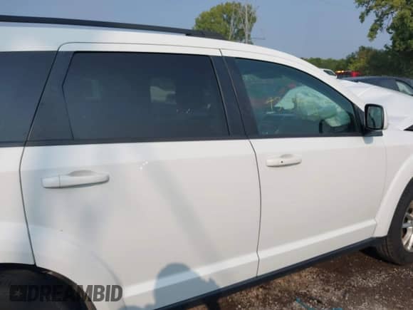 2017 Dodge Journey SXT z VIN 3C4PDCBG8HT511551, wystawiony jako IAAI lot #43159068 z przebiegiem 140 897 mil mil oraz . Historia ofert i sprzedaży dostępna na DreamBid. Obrazek 13.