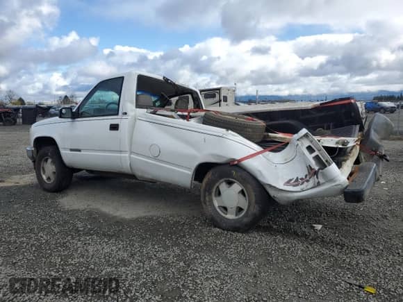 1997 GMC Sierra 1500 with VIN 1GTEK14W5VZ551810, listed as a Copart auction lot 47287015 with 168,113 mi miles and Salvage title. Bid and sale history available at DreamBid. Image 2.