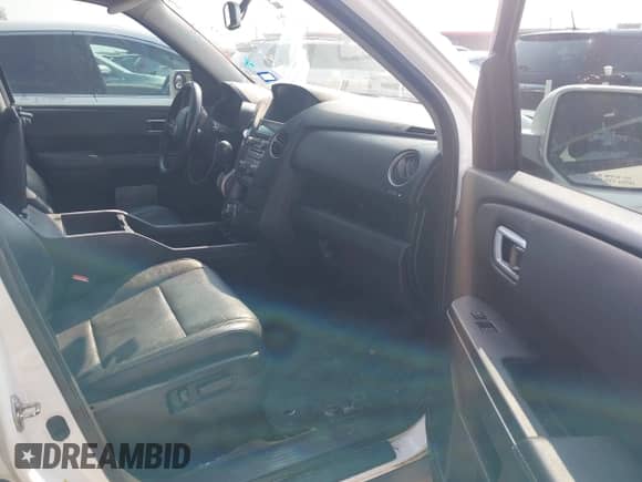 2015 Honda Pilot Touring с VIN 5FNYF3H92FB007774, выставлен на аукционе IAAI как лот 43083627 с пробегом 148 676 миль миль и . История ставок и продаж доступна на DreamBid. Изображение 5.