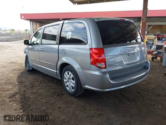 2014 Dodge Grand Caravan SE with VIN 2C4RDGBG6ER246062, listed as a IAAI auction lot 43253605 with 185,817 mi miles and . Bid and sale history available at DreamBid. Image 3.