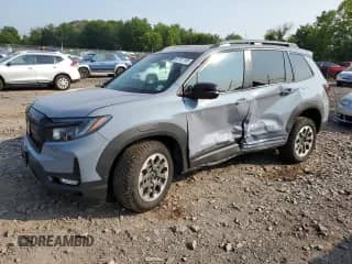 2025 Honda Passport TrailSport with VIN 5FNYF8H6XSB005686, listed as a Copart auction lot 67191165 with 8,768 mi miles and Salvage title. Bid and sale history available at DreamBid. Image 1.