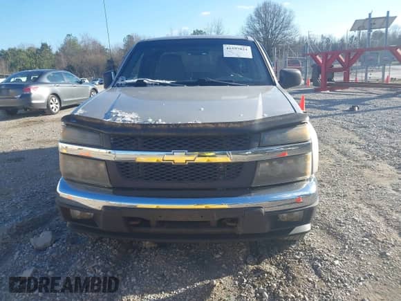 2005 Chevrolet Colorado LS Z71 z VIN 1GCDS196758119567, wystawiony jako IAAI lot #41597821 z przebiegiem 194 611 mil mil oraz . Historia ofert i sprzedaży dostępna na DreamBid. Obrazek 6.