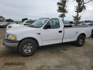 1999 Ford F-150 XL z VIN 1FTRF17L3XKA66147, wystawiony jako Copart lot #69105514 z przebiegiem 179 426 mil mil oraz Czysty tytuł • Clean title. Historia ofert i sprzedaży dostępna na DreamBid. Obrazek 1.