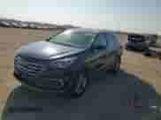 2018 Hyundai Santa Fe 2.4L с VIN 5XYZT3LB9JG573343, выставлен на аукционе Copart как лот 70409315 с пробегом 180 122 миль миль и Списание • Salvage title. История ставок и продаж доступна на DreamBid. Изображение 14.