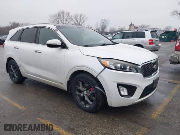 2016 Kia Sorento SXL z VIN 5XYPKDA59GG116070, wystawiony jako IAAI lot #41503521 z przebiegiem 108 516 mil mil oraz . Historia ofert i sprzedaży dostępna na DreamBid. Obrazek 1.