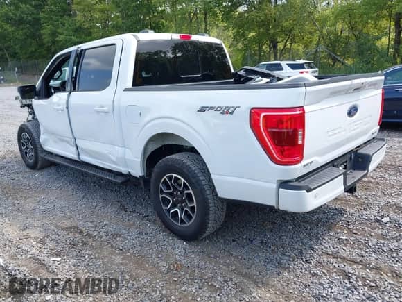 2023 Ford F-150 XL z VIN 1FTEW1EP6PKF93748, wystawiony jako IAAI lot #43030311 z przebiegiem 27 063 mil mil oraz . Historia ofert i sprzedaży dostępna na DreamBid. Obrazek 3.