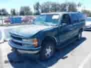 1999 Chevrolet Tahoe z VIN 1GNEC13R9XJ503955, wystawiony jako IAAI lot #42830511 z przebiegiem 185 483 mil mil oraz . Historia ofert i sprzedaży dostępna na DreamBid. Obrazek 2.