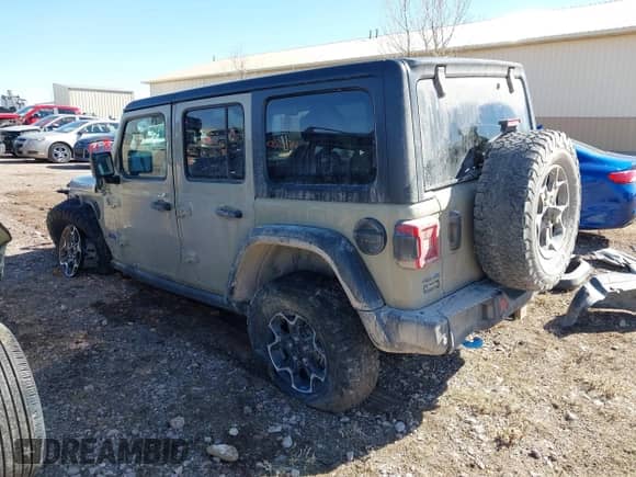 2022 Jeep Wrangler Unlimited Rubicon with VIN 1C4JJXR64NW238262, listed as a IAAI auction lot 41705974 with 31,568 mi miles and . Bid and sale history available at DreamBid. Image 3.