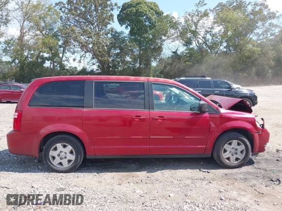 2009 Dodge Grand Caravan SE with VIN 2D8HN44E39R593780, listed as a IAAI auction lot 43301505 with 119,834 mi miles and . Bid and sale history available at DreamBid. Image 13.