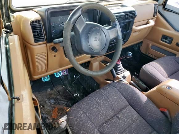 1997 Jeep Wrangler SE z VIN 1J4FY29P8VP471563, wystawiony jako Copart lot #64305655 z przebiegiem Nie podano mil oraz Szkoda całkowita • Salvage title. Historia ofert i sprzedaży dostępna na DreamBid. Obrazek 8.