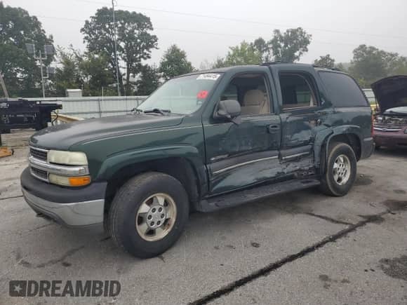 2002 Chevrolet Tahoe Z71 с VIN 1GNEK13Z52R325832, выставлен на аукционе Copart как лот 71494415 с пробегом Не указан миль и Списание • Salvage title. История ставок и продаж доступна на DreamBid. Изображение 1.