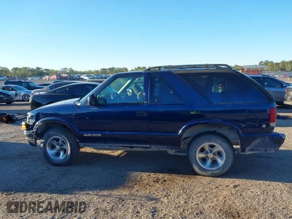 2002 Chevrolet Blazer LS с VIN 1GNCS18W12K127425, выставлен на аукционе IAAI как лот 41823290 с пробегом 182 949 миль миль и . История ставок и продаж доступна на DreamBid. Изображение 15.