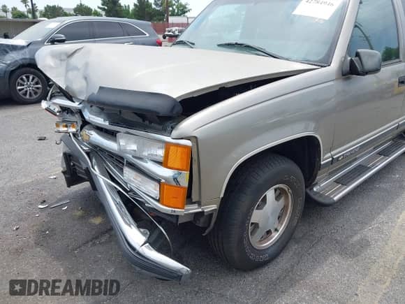 1999 Chevrolet Tahoe Police Special z VIN 1GNEC13RXXR103372, wystawiony jako IAAI lot #42784946 z przebiegiem 52 046 mil mil oraz . Historia ofert i sprzedaży dostępna na DreamBid. Obrazek 14.