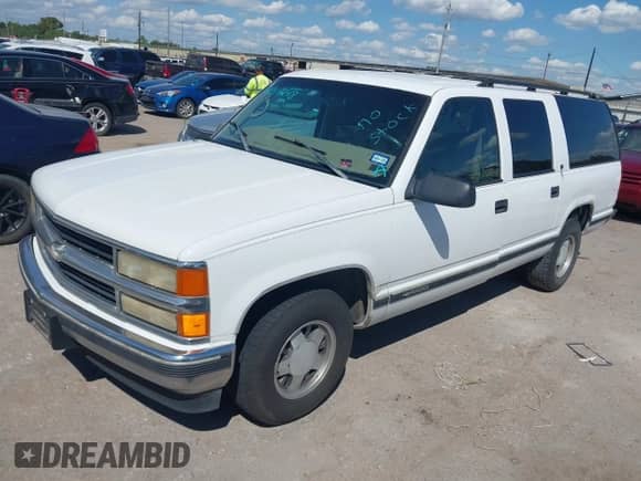 1999 Chevrolet Suburban z VIN 3GNEC16R8XG124569, wystawiony jako IAAI lot #43317248 z przebiegiem 254 826 mil mil oraz . Historia ofert i sprzedaży dostępna na DreamBid. Obrazek 2.
