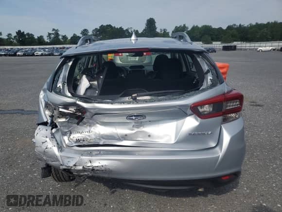 2023 Subaru Impreza Premium with VIN 4S3GTAD67P3710922, listed as a Copart auction lot 66517285 with 56,621 mi miles and Salvage title. Bid and sale history available at DreamBid. Image 6.