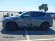 2022 Mazda CX-5 S Carbon Edition z VIN JM3KFBCM7N1601447, wystawiony jako IAAI lot #42463014 z przebiegiem 37 126 mil mil oraz . Historia ofert i sprzedaży dostępna na DreamBid. Obrazek 14.