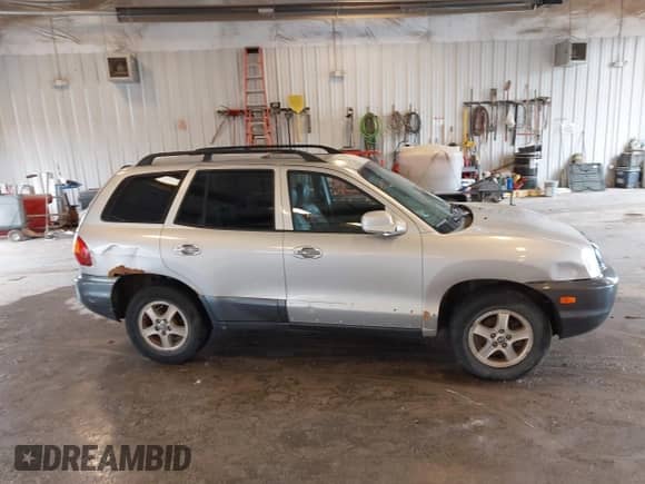 2003 Hyundai Santa Fe LX с VIN KM8SC73E53U531087, выставлен на аукционе IAAI как лот 43283614 с пробегом 212 129 миль миль и . История ставок и продаж доступна на DreamBid. Изображение 6.