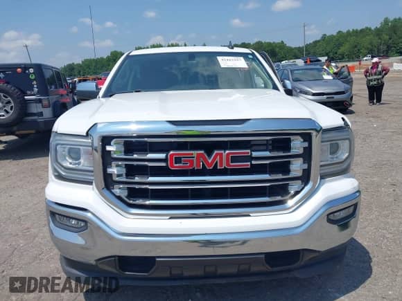 2018 GMC Sierra 1500 SLT z VIN 3GTP1NEC3JG628272, wystawiony jako IAAI lot #42425257 z przebiegiem 66 413 mil mil oraz . Historia ofert i sprzedaży dostępna na DreamBid. Obrazek 12.