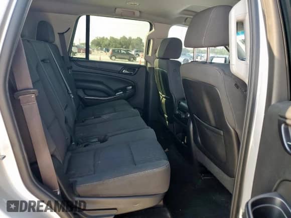2015 Chevrolet Tahoe LS с VIN 1GNSCAKC5FR308869, выставлен на аукционе Copart как лот 72003065 с пробегом 116 502 миль миль и Списание • Salvage title. История ставок и продаж доступна на DreamBid. Изображение 11.