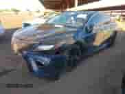 2021 Toyota Camry Hybrid XSE with VIN 4T1K31AK0MU553439, listed as a IAAI auction lot 41558012 with 105,943 mi miles and . Bid and sale history available at DreamBid. Image 16.