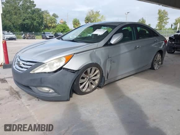 2013 Hyundai Sonata Limited with VIN 5NPEC4AC9DH621632, listed as a IAAI auction lot 43405790 with 243,889 mi miles and . Bid and sale history available at DreamBid. Image 2.