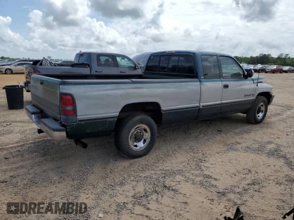 1996 Dodge RAM with VIN 3B7KC23W5TM190309, listed as a Copart auction lot 52730595 with 258,152 mi miles and Salvage title. Bid and sale history available at DreamBid. Image 3.