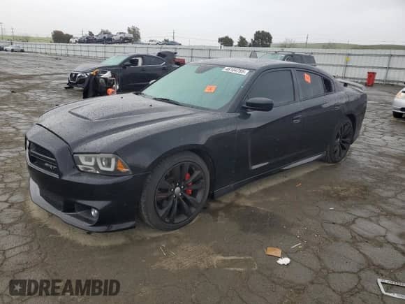 2013 Dodge Charger SRT-8 z VIN 2C3CDXEJXDH566023, wystawiony jako Copart lot #46104785 z przebiegiem 106 651 mil mil oraz Szkoda całkowita • Salvage title. Historia ofert i sprzedaży dostępna na DreamBid. Obrazek 1.