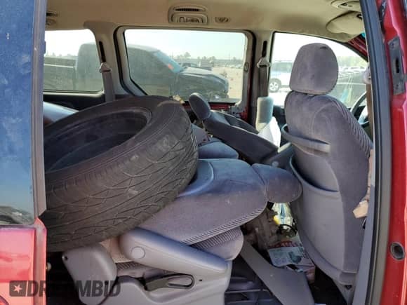 1996 Dodge Caravan LE z VIN 1B4GP54L6TB406737, wystawiony jako Copart lot #77363304 z przebiegiem Nie podano mil oraz Szkoda całkowita • Salvage title. Historia ofert i sprzedaży dostępna na DreamBid. Obrazek 11.