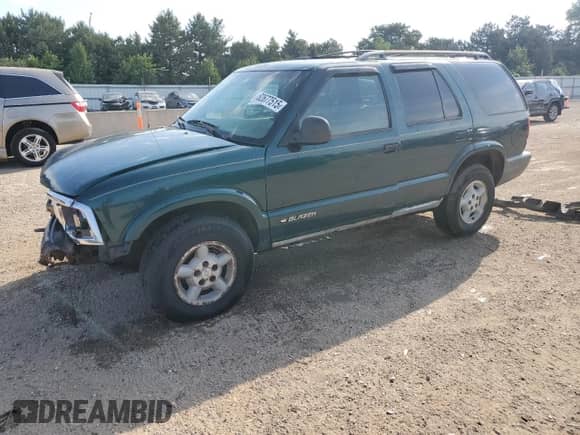 1996 Chevrolet Blazer with VIN 1GNDT13W3T2262402, listed as a Copart auction lot 62677515 with 168,312 mi miles and Salvage title. Bid and sale history available at DreamBid. Image 1.
