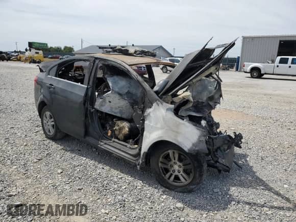 2015 Chevrolet Sonic LT with VIN 1G1JC5SH0F4143049, listed as a Copart auction lot 69755635 with Not provided miles and Salvage title. Bid and sale history available at DreamBid. Image 4.