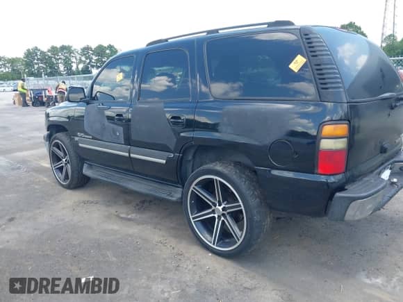 2004 Chevrolet Tahoe LT with VIN 1GNEC13Z74J198516, listed as a IAAI auction lot 42815363 with Not provided miles and . Bid and sale history available at DreamBid. Image 3.