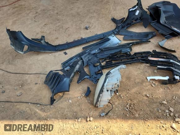 2024 GMC Sierra 1500 AT4 with VIN 3GTUUEEL1RG356892, listed as a Copart auction lot 81197855 with 11,590 mi miles and Salvage title. Bid and sale history available at DreamBid. Image 12.