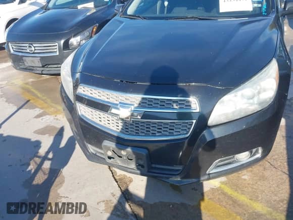 2013 Chevrolet Malibu LTZ z VIN 1G11H5SA3DF343414, wystawiony jako IAAI lot #43434471 z przebiegiem 201 504 mil mil oraz . Historia ofert i sprzedaży dostępna na DreamBid. Obrazek 6.
