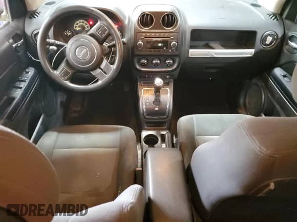 2014 Jeep Compass Sport с VIN 1C4NJDBB0ED784379, выставлен на аукционе Copart как лот 86301525 с пробегом 126 860 миль миль и Списание • Salvage title. История ставок и продаж доступна на DreamBid. Изображение 8.