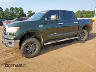 2012 Toyota Tundra с VIN 5TFDW5F18CX211150, выставлен на аукционе Copart как лот 66739115 с пробегом 151 915 миль миль и Списание • Salvage title. История ставок и продаж доступна на DreamBid. Изображение 1.