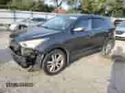 2013 Hyundai Santa Fe Sport z VIN 5XYZW3LA1DG064172, wystawiony jako Copart lot #83823895 z przebiegiem 165 970 mil mil oraz Szkoda całkowita • Salvage title. Historia ofert i sprzedaży dostępna na DreamBid. Obrazek 1.