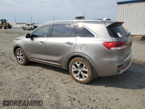 2018 Kia Sorento SX z VIN 5XYPKDA56JG430086, wystawiony jako Copart lot #70511555 z przebiegiem 137 144 mil mil oraz Szkoda całkowita • Salvage title. Historia ofert i sprzedaży dostępna na DreamBid. Obrazek 2.