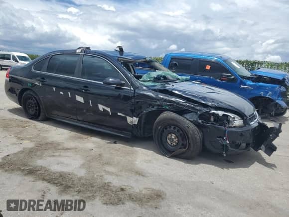 2015 Chevrolet Impala Police Police с VIN 2G1WD5E34F1161097, выставлен на аукционе Copart как лот 60245564 с пробегом Не указан миль и Списание • Salvage title. История ставок и продаж доступна на DreamBid. Изображение 4.