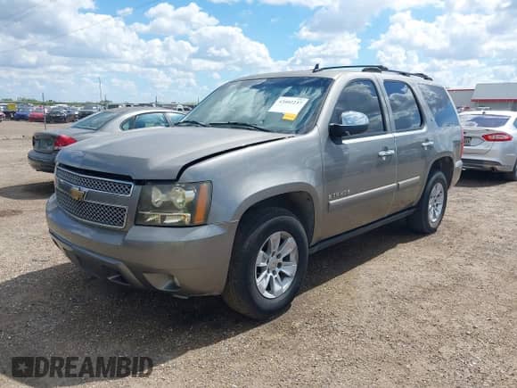 2007 Chevrolet Tahoe LT with VIN 1GNFC13087R300773, listed as a IAAI auction lot 43402237 with 291,337 mi miles and . Bid and sale history available at DreamBid. Image 2.