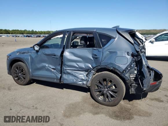 2023 Mazda CX-5 S Carbon Edition z VIN JM3KFBCM5P0219202, wystawiony jako Copart lot #81634365 z przebiegiem 24 429 mil mil oraz Szkoda całkowita • Salvage title. Historia ofert i sprzedaży dostępna na DreamBid. Obrazek 2.
